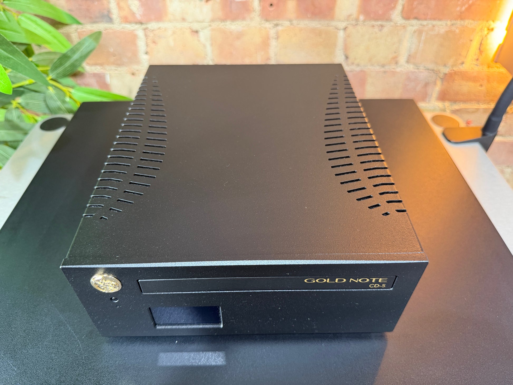 top down view of the Ex-Demonstration Gold Note CD5 on a black stand