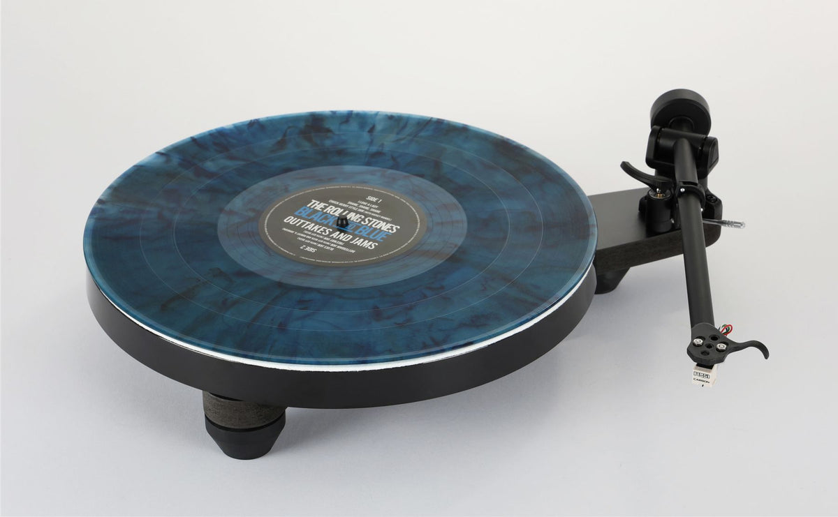 Rega Replay Turntable with blue vinyl record on