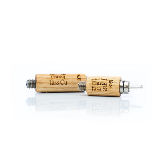 Entreq Tuss Kit copper and silver RCA adapters in waxed oak barrel